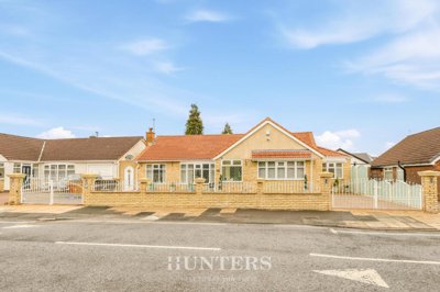 Property on Evesham Road, M24 1PS