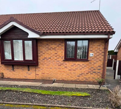 Property on Wood Grove, M34 3DA