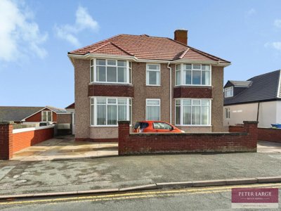 Property on Marine Drive, LL18 3AY