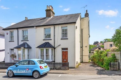 Property on Woodcote Side, KT18 7HB
