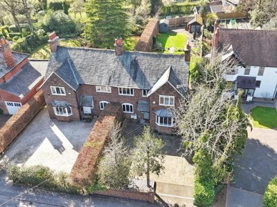 Property on Woodford Road, SK7 1PB