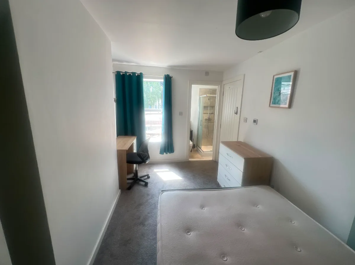 The same bedroom from a third angle, empty then staged — furniture consistent across every shot
