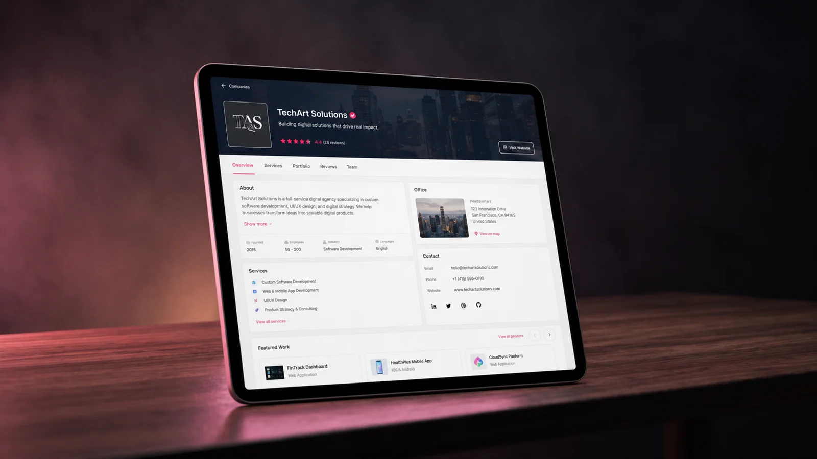 The home.co.uk reviews dashboard for a surveying firm on a MacBook — star ratings and written homemover feedback from completed jobs